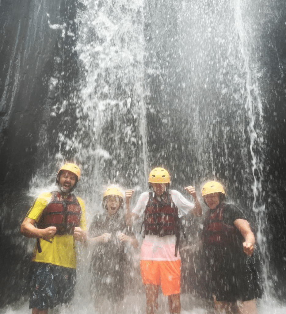 Family in Norway in Waterfall in Ubud